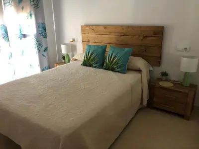 Cama o camas de una habitación en Atico con piscina privada a 100m del mar