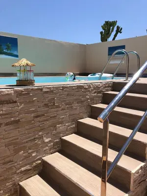 Piscina en o cerca de Atico con piscina privada a 100m del mar