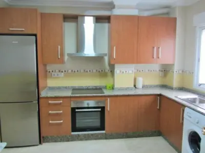 Una cocina o zona de cocina en Apartamento Playa de Garrucha