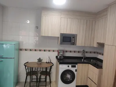 Una cocina o zona de cocina en playa Almería zapillo loft