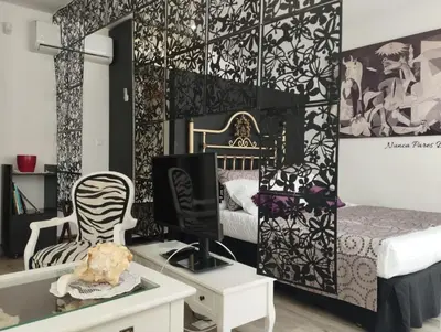 Cama o camas de una habitación en Paradise of Dreams Apartamentos - EL SOLO ÁTICO