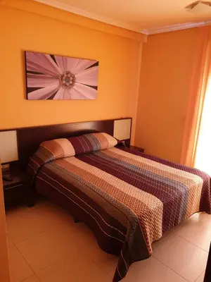 Cama o camas de una habitación en Vera Apartamento Marina Rey