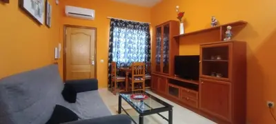Una televisión o centro de entretenimiento en Apartamento Buenavista playa