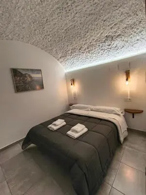Cama o camas de una habitación en La Madriguera Eco Caves