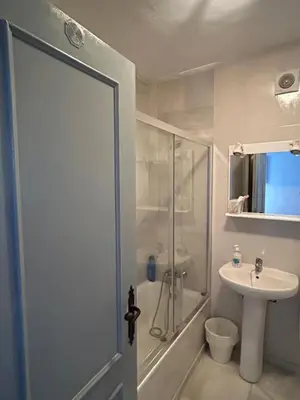 Un baño de Apartment with a great terrace, sea and land views