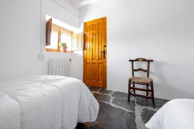 Cama o camas de una habitación en Casa rural El Fuerte de Atabuey