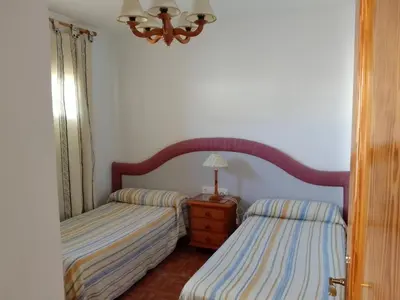 Cama o camas de una habitación en Apartamento Cerca de la Playa con wifi