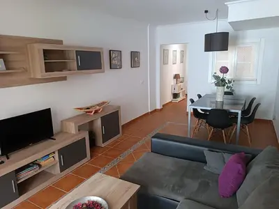 Una televisión o centro de entretenimiento en Apartamento urb spirit
