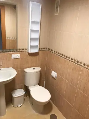 Un baño de Atico con piscina privada y vistas al mar