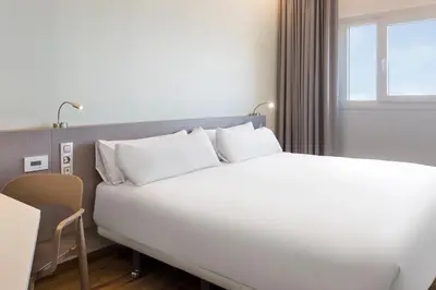 Cama o camas de una habitación en B&B HOTEL Almería Vicar