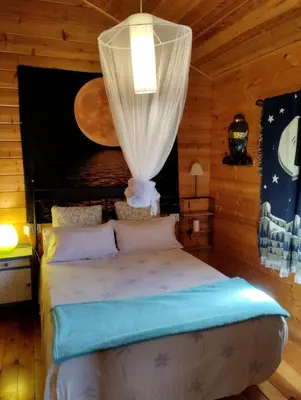 Cama o camas de una habitación en Casa La Colina Mandarina II Casa de madera