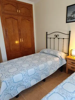 Cama o camas de una habitación en Bahía de Vera Apartamento Fiona