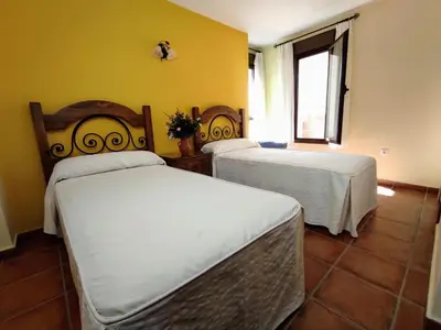 Cama o camas de una habitación en Casa Rural Alquife