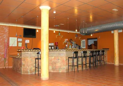El salón o zona de bar de Hostal Mesón Arboleas