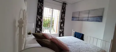 Cama o camas de una habitación en Casas-VeraPlaya Al Andalus Residencial Casa La Libertad