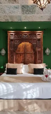 Cama o camas de una habitación en Murallas de Jayrán Hotel Boutique