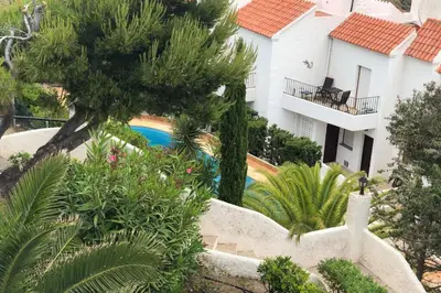Jardín al aire libre en CasaMarga San José Precioso apartamento con piscina y vistas al mar