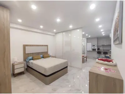 Cama o camas de una habitación en Costa de Almería Loft Las Sirenas