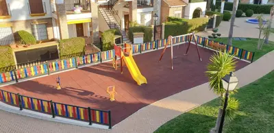 Zona de juegos infantil en Homes of Spain, Al Andalus Residencial G Apartamento precioso con WIFI
