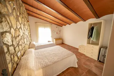 Cama o camas de una habitación en Casa Rural Casa Las Flores