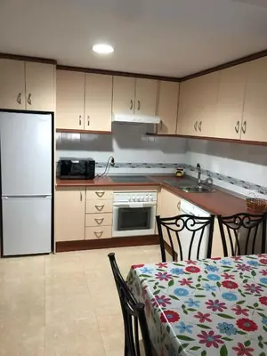 Una cocina o zona de cocina en APARTAMENTO JUNTO A LA PLAYA
