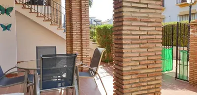 Un balcón o terraza de Homes of Spain, Al Andalus Residencial Apartamento P bajo con WIFI