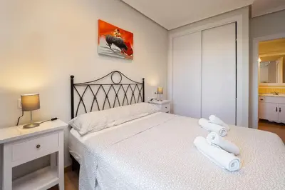 Cama o camas de una habitación en Homes of Spain, Al Andalus Residencial L Apartamento primera planta, WIFI
