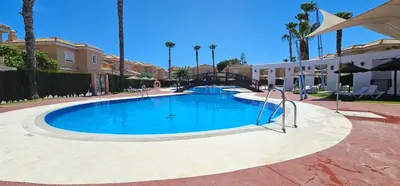 Piscina en o cerca de Homes of Spain, Casa Duplex Playas del Sur, 400m del mar , WIFI