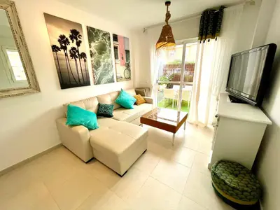 Una televisión o centro de entretenimiento en Casa Natuka - Vera Beach Relax