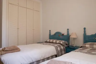 Cama o camas de una habitación en La Aldea de Puerto Rey - apartamento a 300 metros del mar con wifi y parking