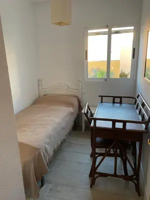 Cama o camas de una habitación en La Aldea de Puerto Rey - apartamento a 300 metros del mar con wifi y parking