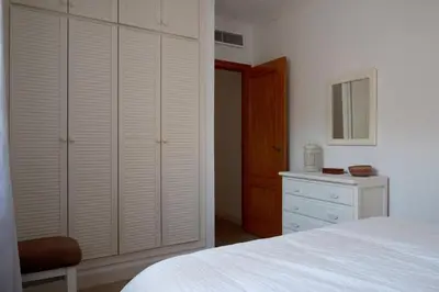 Cama o camas de una habitación en La Aldea de Puerto Rey - apartamento a 300 metros del mar con wifi y parking