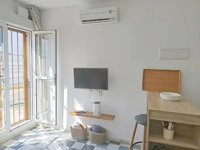 Una televisión o centro de entretenimiento en Estudio Porto