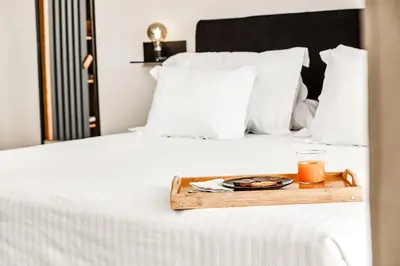 Cama o camas de una habitación en HO By Olivencia Aguadulce