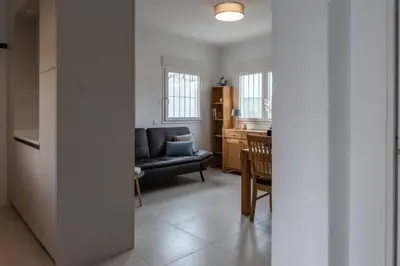 Zona de estar de TurAlmeria - Casa Tranquila con Jardín y Aparcamiento privado