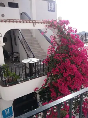 Un balcón o terraza de Boutique Hostal 