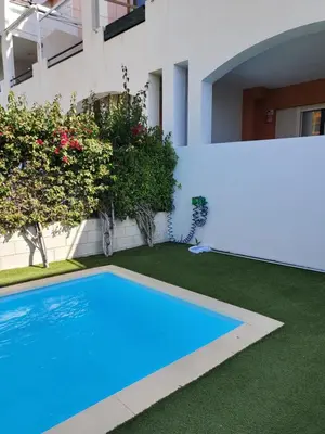 Piscina en o cerca de BAJO en PRIMERA LÍNEA de VERA-PLAYA con piscina privada!