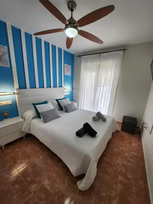 Cama o camas de una habitación en BAJO en PRIMERA LÍNEA de VERA-PLAYA con piscina privada!