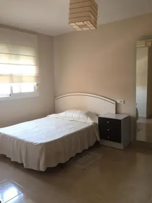 Cama o camas de una habitación en HABITACIONES CACHEMIRES en ALMERIA