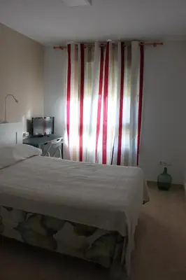 Cama o camas de una habitación en APARTAMENTO LAS PALMERILLAS-RESIDENCIAL TORREQUEBRADA