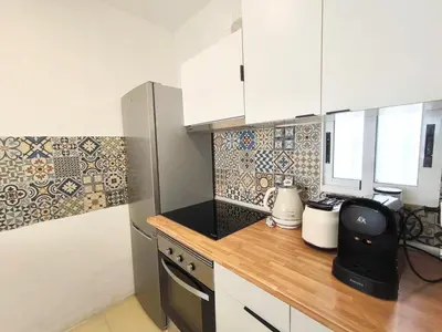 Una cocina o zona de cocina en Marinas Sol - Tu hogar con jardín privado!