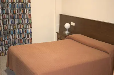 Cama o camas de una habitación en Hostal Casa Juan