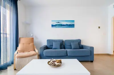 Zona de estar de Apartamentos Delamar