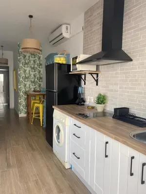 Una cocina o zona de cocina en Vivienda de uso turístico Los Escullos