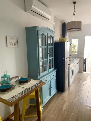 Una cocina o zona de cocina en Vivienda de uso turístico Los Escullos