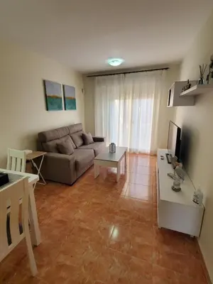 Una televisión o centro de entretenimiento en Ático dúplex precioso con piscina privada en Paraíso de Vera!