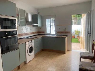 Una cocina o zona de cocina en Casa Rural El Jazminero