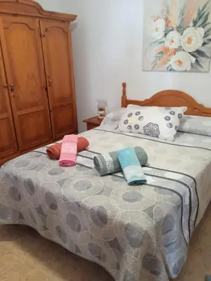 Cama o camas de una habitación en Casa Rural El Jazminero