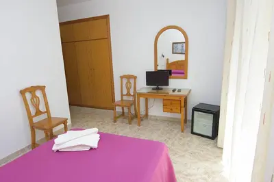 Cama o camas de una habitación en HOTEL DON FELIPE