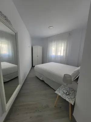 Cama o camas de una habitación en Apartamentos “Mar de Coral” Aguadulce